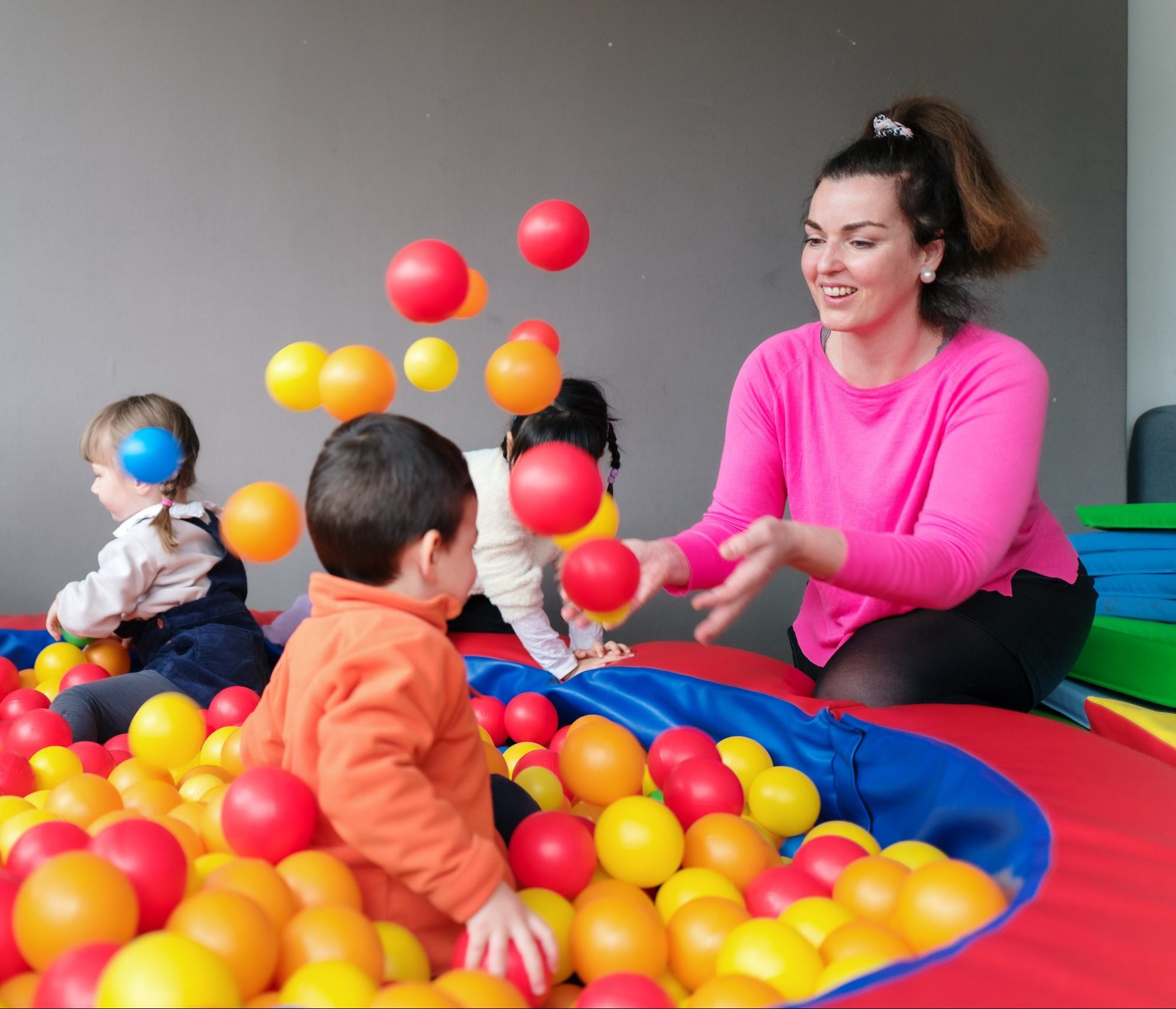 Big Ben Kids International Childcare Practitioner Playing Ball Pit Scaled E1624606904295